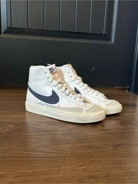 Nike White High-Top Sneakers with Navy Swoosh